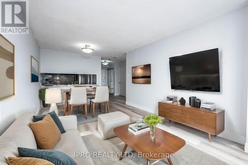 909 - 10 Laurelcrest Street, Brampton, ON - Indoor Photo Showing Living Room