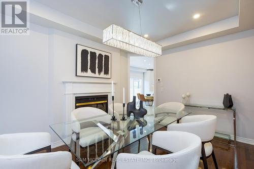 3875 Candlelight Drive, Mississauga (Churchill Meadows), ON - Indoor Photo Showing Dining Room With Fireplace