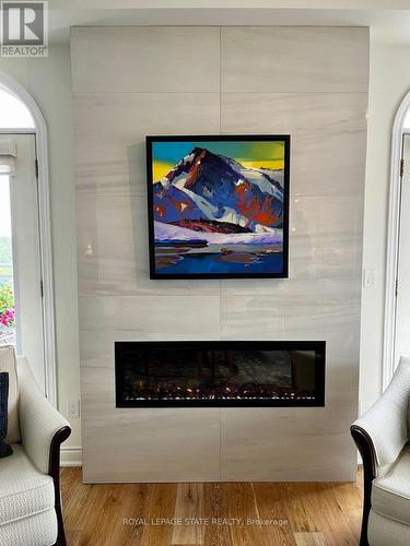 902 - 4000 Creekside Drive, Hamilton, ON - Indoor Photo Showing Living Room With Fireplace