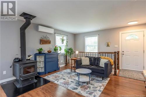 23 Holland Lane, Cambridge-Narrows, NB - Indoor Photo Showing Living Room With Fireplace