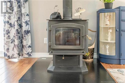 23 Holland Lane, Cambridge-Narrows, NB - Indoor Photo Showing Other Room With Fireplace