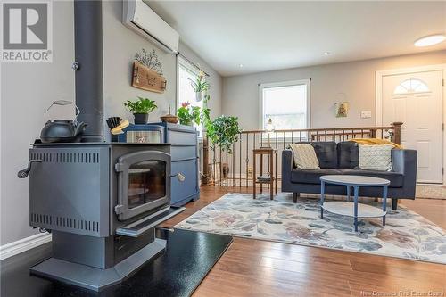 23 Holland Lane, Cambridge-Narrows, NB - Indoor Photo Showing Living Room With Fireplace