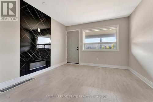 2009 Brampton Street, Hamilton (Parkview), ON - Indoor Photo Showing Other Room With Fireplace