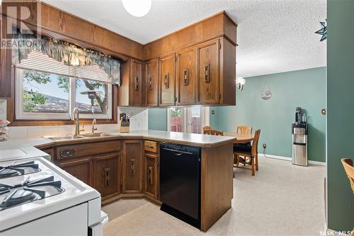 6139 7Th Avenue N, Regina, SK - Indoor Photo Showing Kitchen With Double Sink