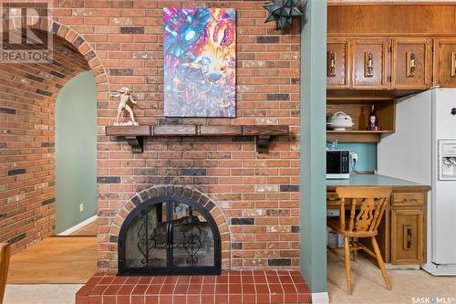 6139 7Th Avenue N, Regina, SK - Indoor Photo Showing Other Room With Fireplace