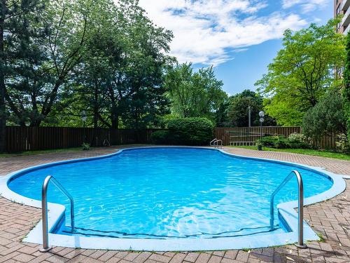 Piscine - 911-6980 Ch. De La Côte-St-Luc, Montréal (Côte-Des-Neiges/Notre-Dame-De-Grâce), QC - Outdoor With In Ground Pool With Backyard