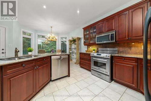 33 Yuill Crescent, Prince Edward County (Ameliasburgh), ON - Indoor Photo Showing Kitchen With Double Sink