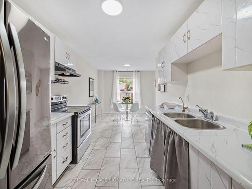 1120 Tanzer Crt, Pickering, ON - Indoor Photo Showing Kitchen With Double Sink