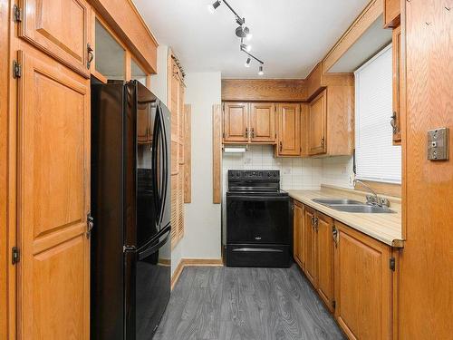 Cuisine - 7430 24E Avenue, Montréal (Villeray/Saint-Michel/Parc-Extension), QC - Indoor Photo Showing Kitchen With Double Sink