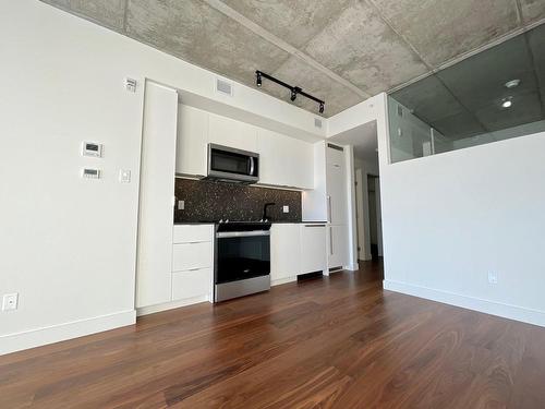 Living room - 425-200 Boul. Marcel-Laurin, Montréal (Saint-Laurent), QC - Indoor Photo Showing Kitchen