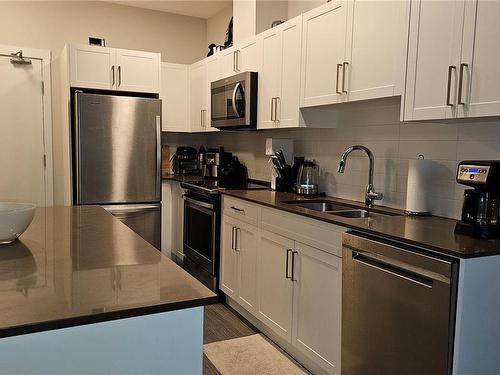 204-2843 Jacklin Rd, Langford, BC - Indoor Photo Showing Kitchen With Stainless Steel Kitchen With Double Sink