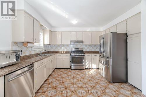 4 Manorcrest Street, Brampton, ON - Indoor Photo Showing Kitchen With Double Sink