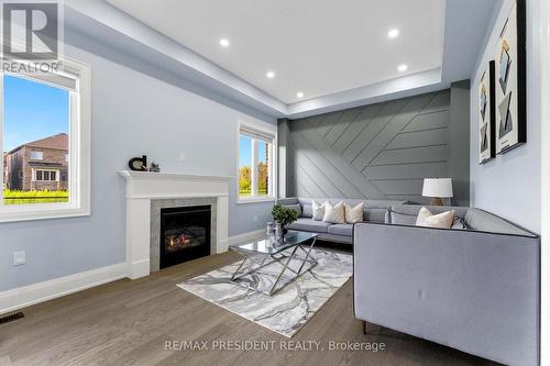 223 Granite Ridge Trail, Hamilton (Waterdown), ON - Indoor Photo Showing Living Room With Fireplace