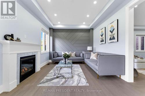 223 Granite Ridge Trail, Hamilton (Waterdown), ON - Indoor Photo Showing Living Room With Fireplace