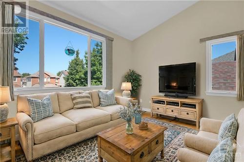 Staged family room - 14 Knowlton Drive, Ottawa, ON - Indoor Photo Showing Living Room