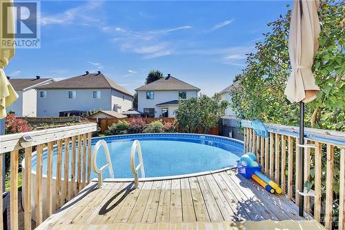 Inviting view into backyard - 14 Knowlton Drive, Ottawa, ON - Outdoor With Above Ground Pool With Deck Patio Veranda With Exterior