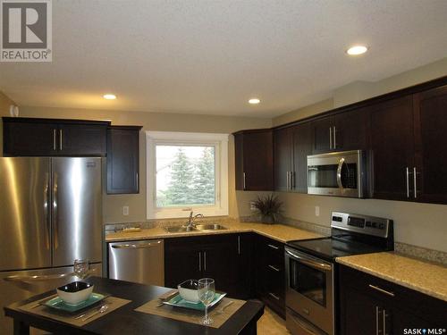 1-4 638 Albert Street, Estevan, SK - Indoor Photo Showing Kitchen With Double Sink