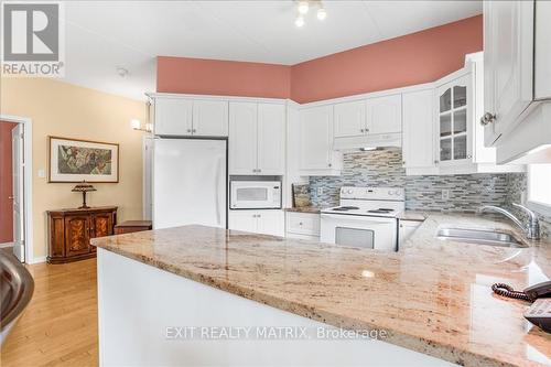 114 - 1404 Clement Street, Hawkesbury, ON - Indoor Photo Showing Kitchen With Double Sink