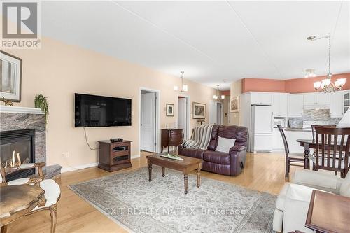 114 - 1404 Clement Street, Hawkesbury, ON - Indoor Photo Showing Living Room With Fireplace