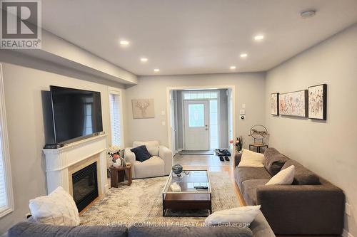 181 William Berczy Boulevard, Markham (Berczy), ON - Indoor Photo Showing Living Room With Fireplace