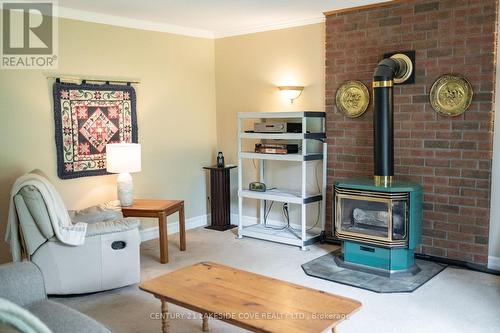 27 Thicketwood Place, Ramara (Brechin), ON - Indoor Photo Showing Other Room With Fireplace