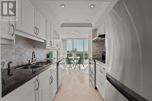 1802 - 3 Rowntree Road, Toronto (Mount Olive-Silverstone-Jamestown), ON - Indoor Photo Showing Kitchen With Stainless Steel Kitchen With Double Sink With Upgraded Kitchen