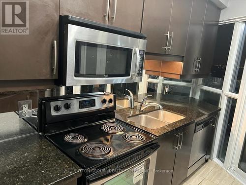 1901 - 60 Absolute Avenue, Mississauga, ON - Indoor Photo Showing Kitchen With Stainless Steel Kitchen With Double Sink With Upgraded Kitchen