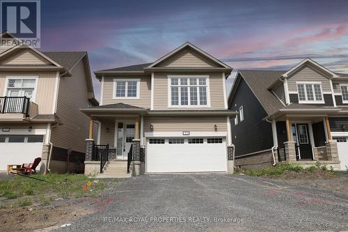 57 Golf Links Drive, Loyalist, ON - Outdoor With Facade