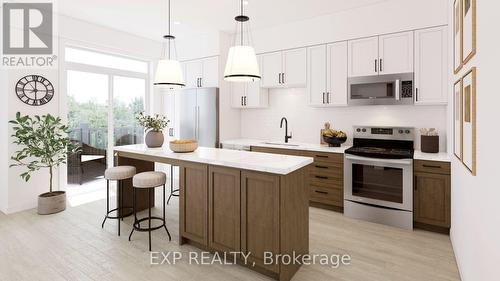 B122 - 824 Woolwich Street, Guelph, ON - Indoor Photo Showing Kitchen With Stainless Steel Kitchen With Upgraded Kitchen