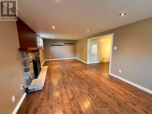 Lower - 404 Trent Street, Whitby, ON - Indoor Photo Showing Other Room With Fireplace