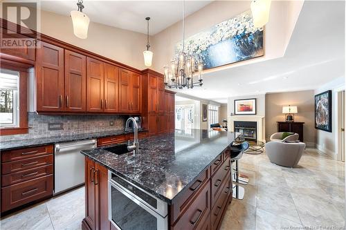 373 Lavoie, Dieppe, NB - Indoor Photo Showing Kitchen With Fireplace