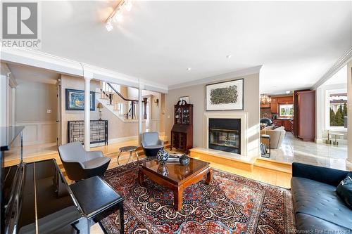 373 Lavoie, Dieppe, NB - Indoor Photo Showing Living Room With Fireplace