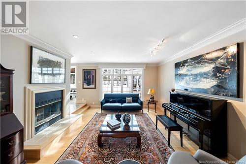 373 Lavoie, Dieppe, NB - Indoor Photo Showing Living Room With Fireplace