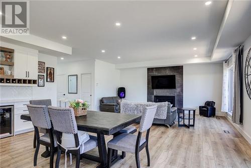 2963 Windstar Avenue, Chelmsford, ON - Indoor Photo Showing Dining Room With Fireplace