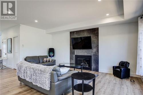 2963 Windstar Avenue, Chelmsford, ON - Indoor Photo Showing Living Room With Fireplace