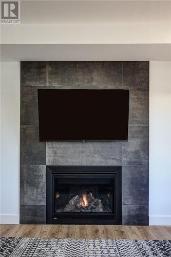 2963 Windstar Avenue, Chelmsford, ON - Indoor Photo Showing Living Room With Fireplace