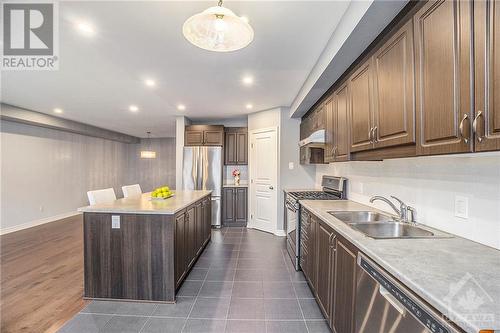 Functional kitchen with ample storage and a walk-in pantry - 445 Barrick Hill Road, Ottawa, ON - Indoor Photo Showing Kitchen With Double Sink With Upgraded Kitchen