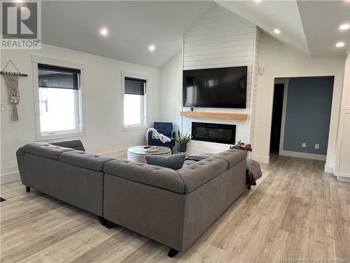 76 Guy, Shediac, NB - Indoor Photo Showing Living Room With Fireplace