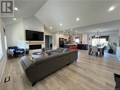 76 Guy, Shediac, NB - Indoor Photo Showing Living Room With Fireplace