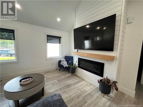 76 Guy, Shediac, NB - Indoor Photo Showing Living Room With Fireplace