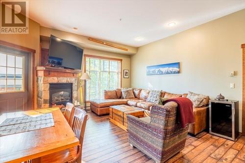 5258 Highline  Drive Unit# 119, Fernie, BC - Indoor Photo Showing Living Room With Fireplace