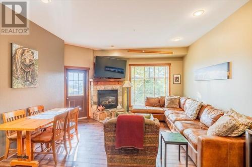 5258 Highline  Drive Unit# 119, Fernie, BC - Indoor Photo Showing Living Room With Fireplace