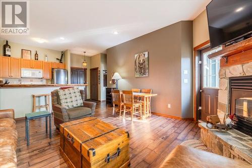 5258 Highline  Drive Unit# 119, Fernie, BC - Indoor Photo Showing Living Room With Fireplace