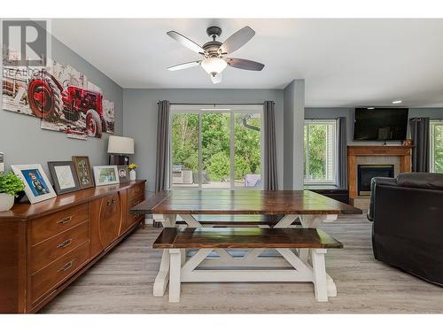 160 Carlin Street, Grindrod, BC - Indoor Photo Showing Other Room With Fireplace