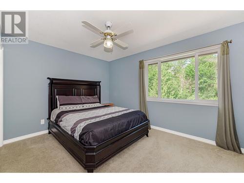 160 Carlin Street, Grindrod, BC - Indoor Photo Showing Bedroom