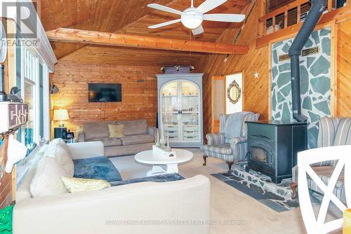 34 Deweys Island, Kawartha Lakes, ON - Indoor Photo Showing Living Room With Fireplace