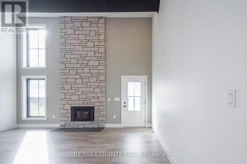 225 Mitchell'S Crossroad, Prince Edward County (North Marysburgh), ON - Indoor Photo Showing Other Room With Fireplace