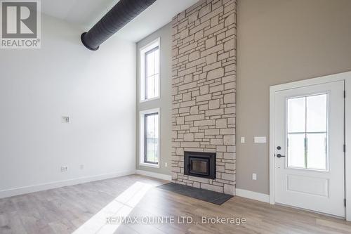 225 Mitchell'S Crossroad, Prince Edward County (North Marysburgh), ON - Indoor Photo Showing Living Room With Fireplace