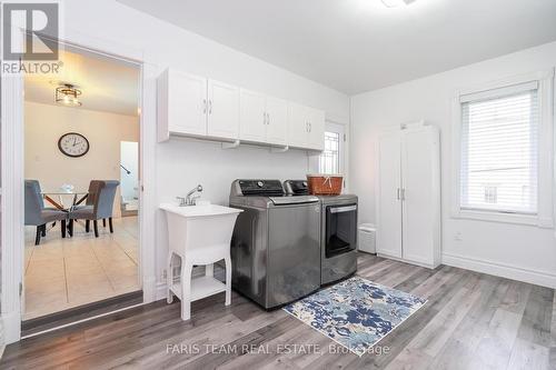 62 Fletcher Crescent, New Tecumseth, ON - Indoor Photo Showing Laundry Room