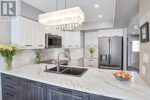 35 - 21 Laguna Parkway, Ramara (Brechin), ON - Indoor Photo Showing Kitchen With Double Sink With Upgraded Kitchen